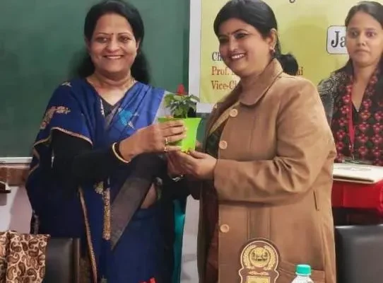 **Prof. Tanuja of Jamia Millia Islamia, an invited speaker, being felicitated by Prof. Neelam during the seminar.**